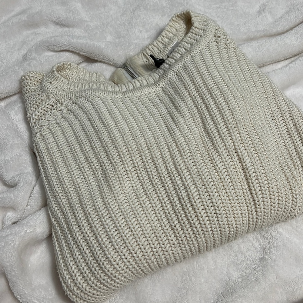 Back zipper style ivory sweater